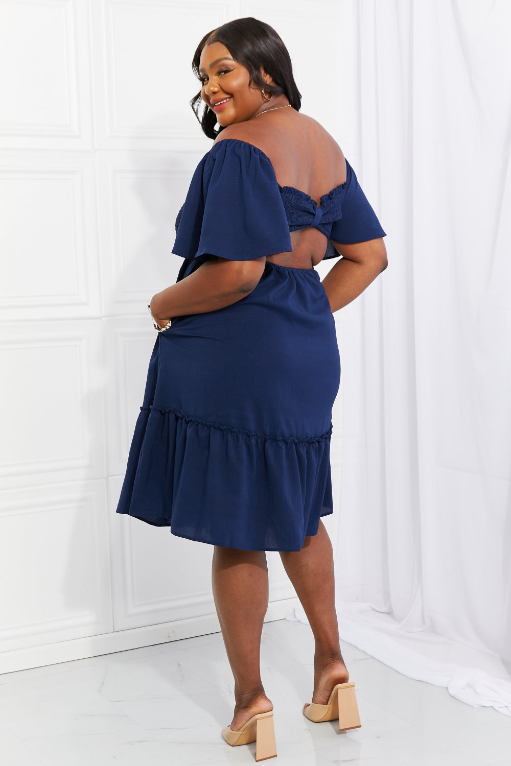 Davi & Dani Full Size Let's Laugh Smocked Bow-Look Back Dress